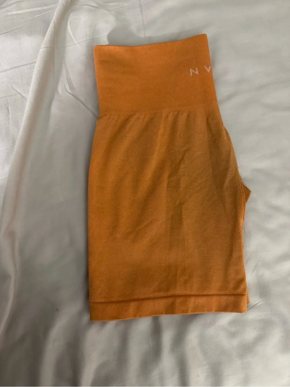 NVGTN Women’s High-Rise Orange Bike Shorts